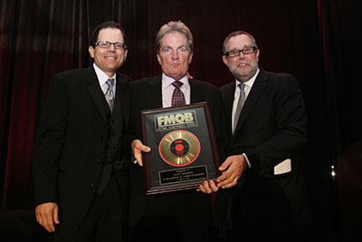 Scott Shannon accepts from Richard Palmese.