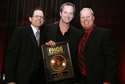 Tom Poleman receives award from FD and Cubby.
