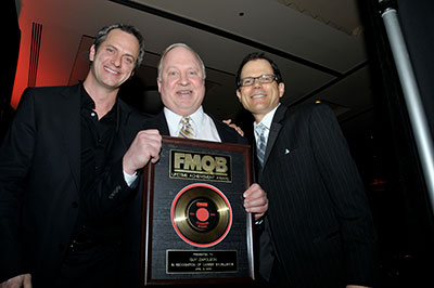 Receiving a Career Achievement Award in 2008 from Tom Poleman (“When he was programming Z100, he was one of the most gifted programmers I ever worked with”); and Fred Deane