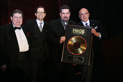 Kal Rudman, Fred Deane, Bob Burke, and Lifetime Achievement recipient Clive Davis.